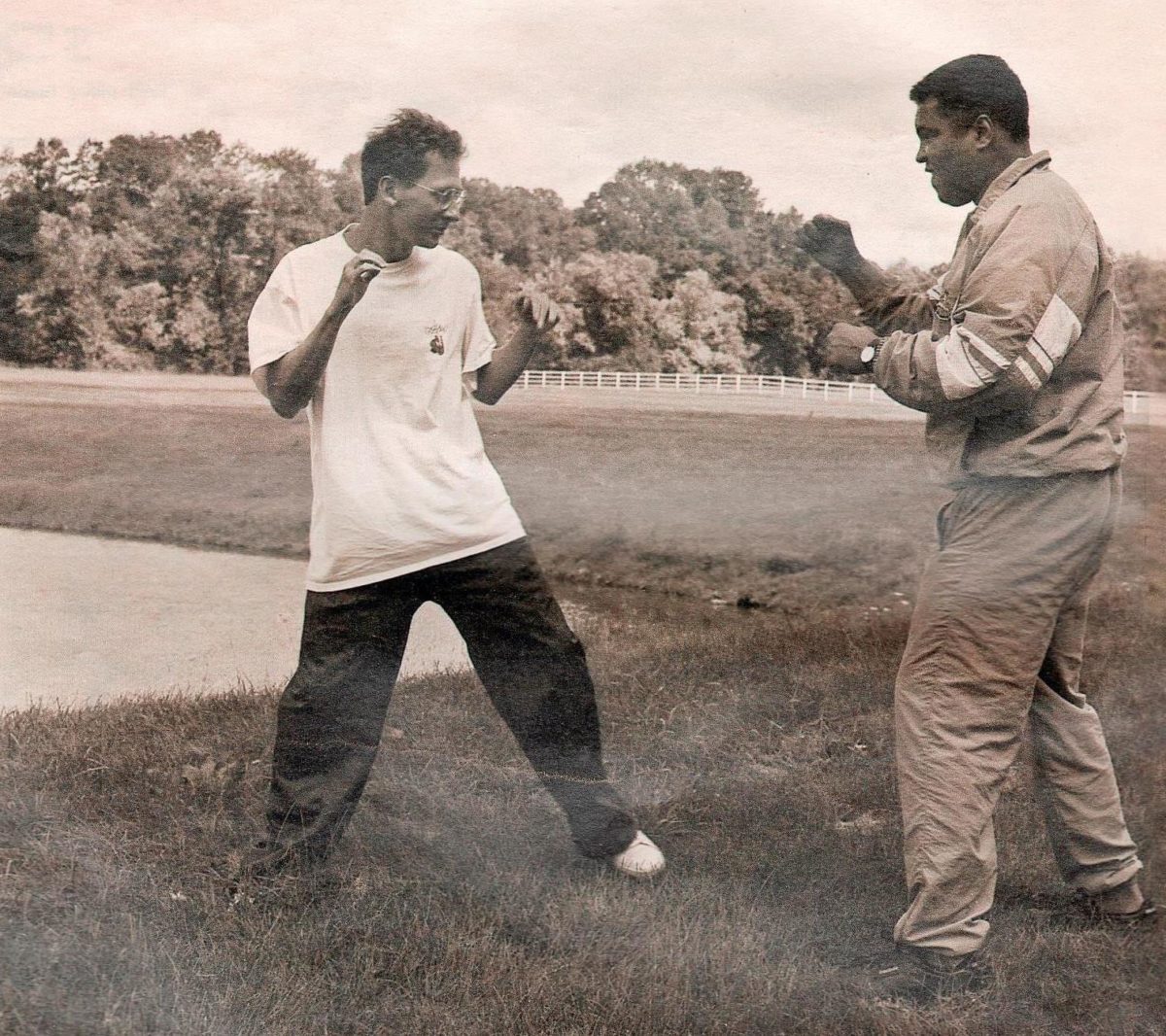 Muhammad Ali and Davis Miller in a fighting stance. Photo courtesy Davis Miller from his book 'Approaching Ali'