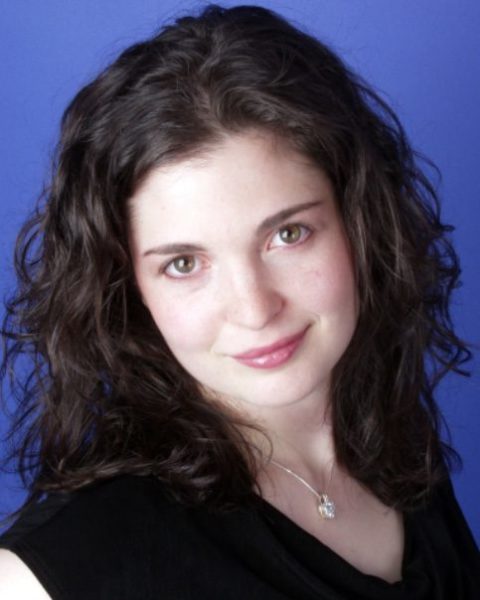 Athena Mertes, Soprano, against a blue background.